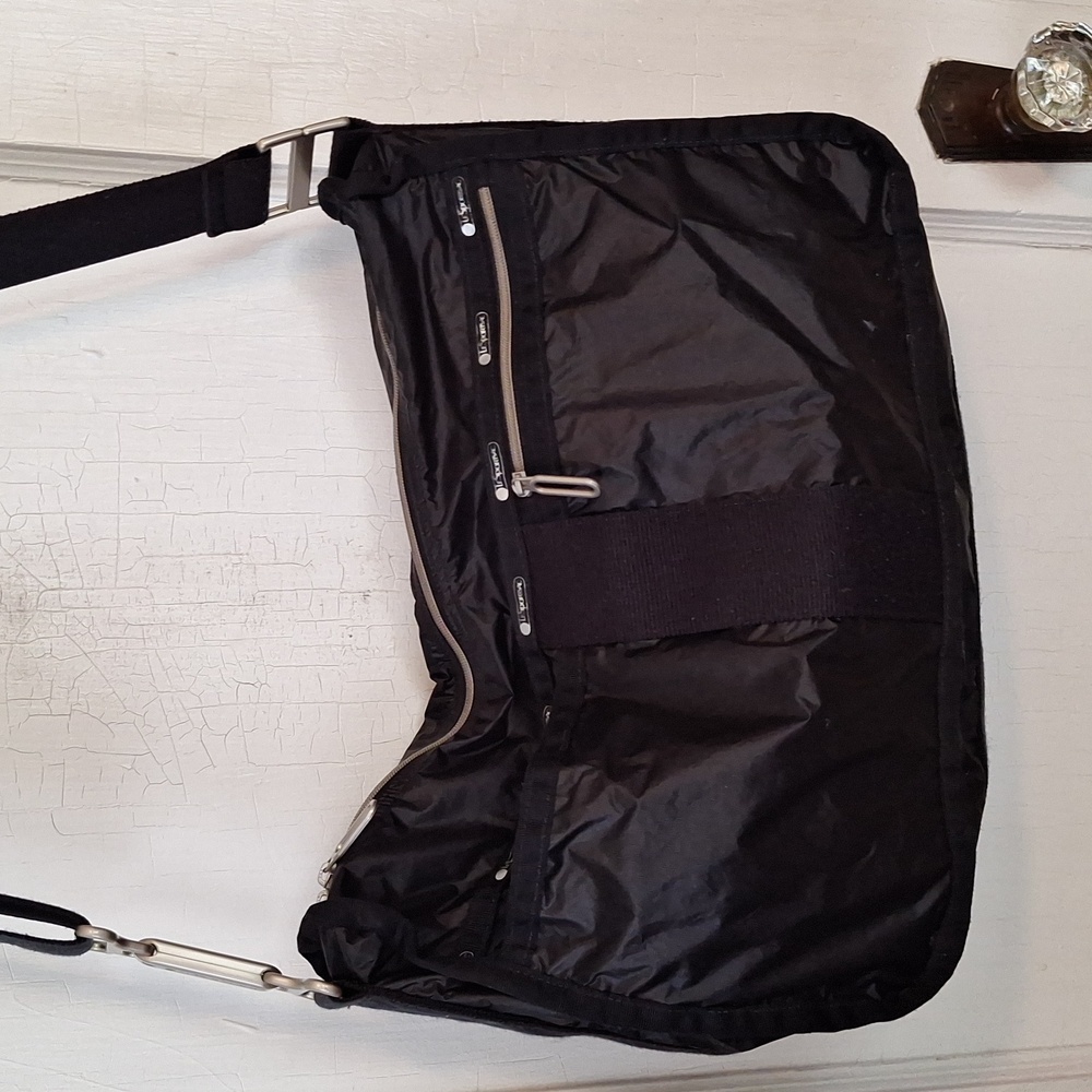 LESPORTSAC Adjustable multi purpose bag.